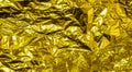 Gold crumpled aluminum foil texture background Royalty Free Stock Photo