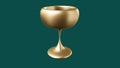 Gold cup isolated on green background