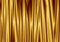 Gold curtain reflect with light spot on background.