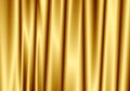 Gold curtain reflect with light spot on background.