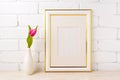 Gold decorated frame mockup with magenta pink tulip