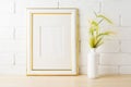 Gold decorated frame mockup with yellow green wild grass ears Royalty Free Stock Photo