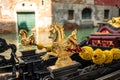 Gold decoration on the gondola. Detail Venetian Gondola Stern Detail or Ornament on the Grand Canal in Venice Royalty Free Stock Photo