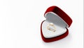 Gold diamond ring with 3D design, housed in an open red velvet jewelry box on white background. Royalty Free Stock Photo