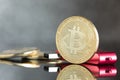 Gold digital cruptocurrency coin pile bitcoin with red hardware