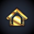 Gold Dog house icon isolated on black background. Dog kennel. Vector