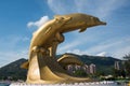 Gold dolphin sculpture