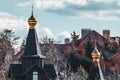 Gold dome with cross on wooden church top scenic Royalty Free Stock Photo