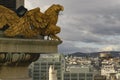 Gold eagles on the tower of Karlskirche and Panoramic view of Vienna from the St. Charles Church in Vienna, Austria Royalty Free Stock Photo
