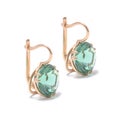 Gold earrings with emerald isolated on white