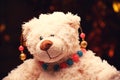 Gold earrings pink blue agate stone beads toy bear gold bokeh Royalty Free Stock Photo
