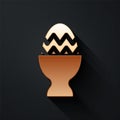 Gold Easter egg on a stand icon isolated on black background. Happy Easter. Long shadow style. Vector. Royalty Free Stock Photo