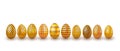 Gold Easter eggs set. 3d realistic egg design isolated on white background. Royalty Free Stock Photo
