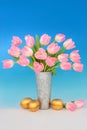 Gold Easter Eggs and Spring Tulip Flower Bouquet Royalty Free Stock Photo