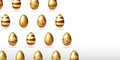Gold eggs on white background with copy space Royalty Free Stock Photo