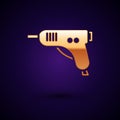 Gold Electric hot glue gun icon isolated on black background. Hot pistol glue. Hot repair work appliance silicone