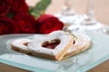 Gold engagement ring and shortbread hearts