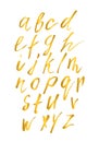 Gold English alphabet. Letters A-Z painted with brush isolated on white. Expressive calligraphy font. Latin lowercase symbols.