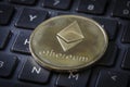 Gold Etherium Token on Keyboard Royalty Free Stock Photo