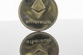 Gold Etherium Token with white background