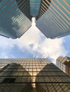 Gold exterior glass of office building, blue sky and white cloud Royalty Free Stock Photo