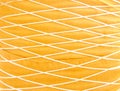 Gold fabric background with interlace of thread patterns texture