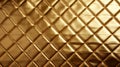 Gold fabric square stitched wallpaper with copy space. Background concept.