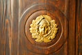 gold face house door in italy lombardy Royalty Free Stock Photo