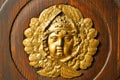 gold face house door in italy lombardy column Royalty Free Stock Photo