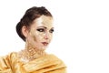 Gold face make-up Royalty Free Stock Photo