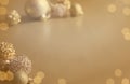 Gold Festive Christmas background. Christmas ball golden decoration. Royalty Free Stock Photo