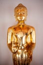 Gold figure of Buddha in temple Bangkok, Thailand. Close-up