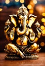 gold figurine of Ganesha. Selective focus.