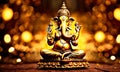 gold figurine of Ganesha. Selective focus.