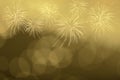 Gold firework and blurred bokeh light with copy space in Christmas and New Year. Abstract background holiday concept