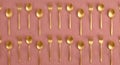 Gold Flatware Pattern Golden Utensils on Pink Background Table Setting Design Royalty Free Stock Photo