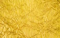 Gold foil abstract texture background. Element of design in your work background. Decoration for backdrop, wallpaper. Royalty Free Stock Photo