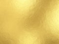 Gold foil background with light reflections Royalty Free Stock Photo