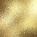 Gold foil background with light reflections