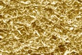 Gold foil background texture. A real scan of foil. Royalty Free Stock Photo