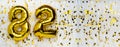 Gold foil balloon number, digit eighty-two. Birthday greeting card with inscription 82. Anniversary celebration. Banner