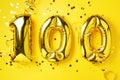 Gold foil balloon number, digit one hundred. Birthday greeting card, inscription 100. Anniversary celebration. Banner Royalty Free Stock Photo