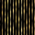 Gold foil hand drawn vertical lines seamless vector pattern. Golden wavy irregular stripes on black background. For Christmas, New