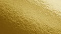 Gold foil texture background with uneven surface Royalty Free Stock Photo