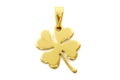 Gold four-leaf clover pendant. Stainless steel necklace Royalty Free Stock Photo