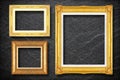 Gold frame on black slate background Royalty Free Stock Photo