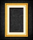 Gold frame on black slate background Royalty Free Stock Photo
