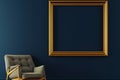 gold frame on a dark blue wall, midcentury armchair below