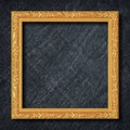 Gold frame on Dark grey black slate background or texture Royalty Free Stock Photo