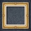 Gold frame on Dark grey black slate background or texture Royalty Free Stock Photo